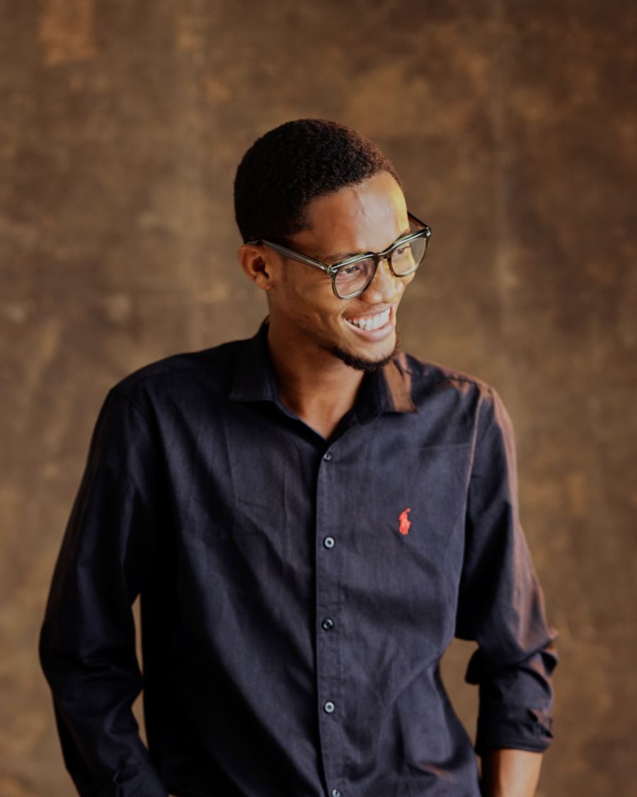 Portrait of a smiling young man in glasses