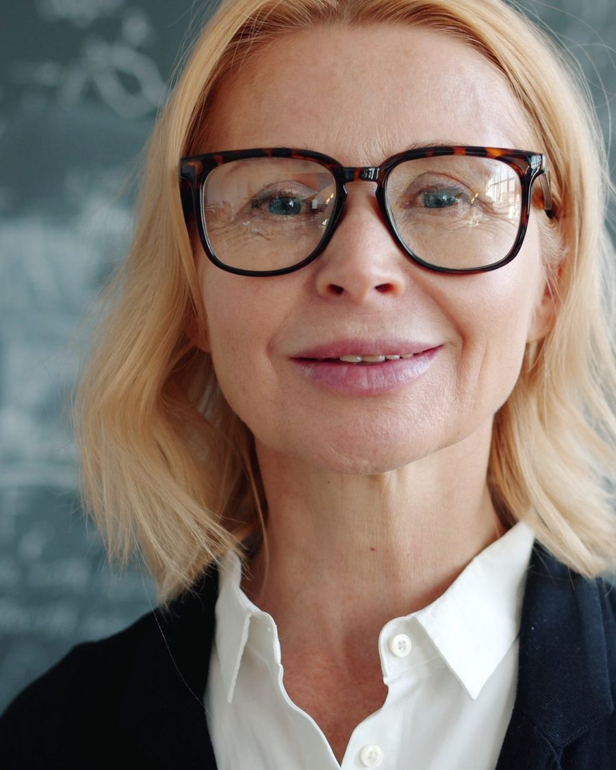 Portrait of a smiling woman in glasses